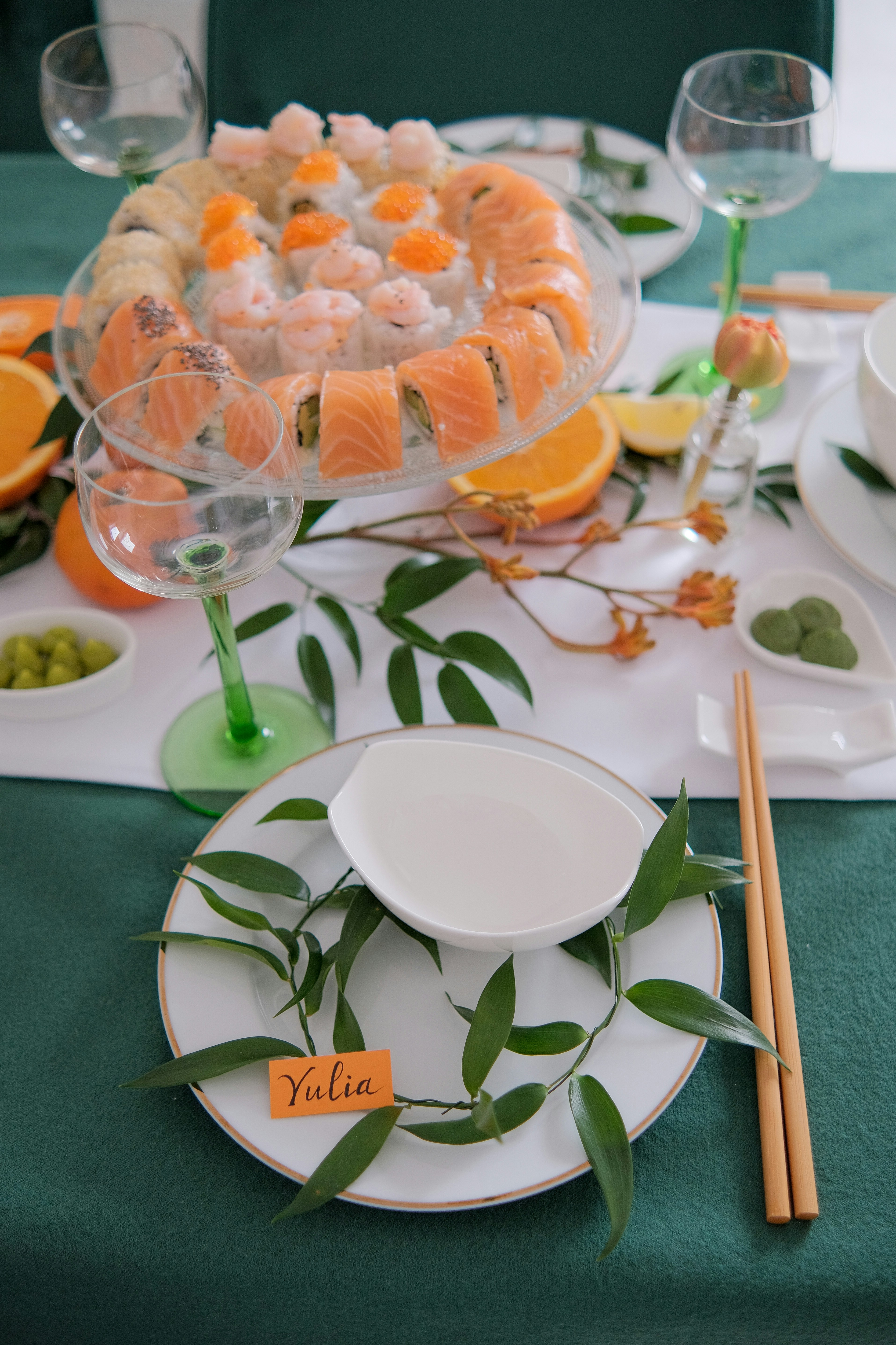 Glass with orange flowers on a table