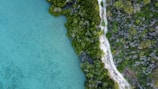 a body of water with land in the back