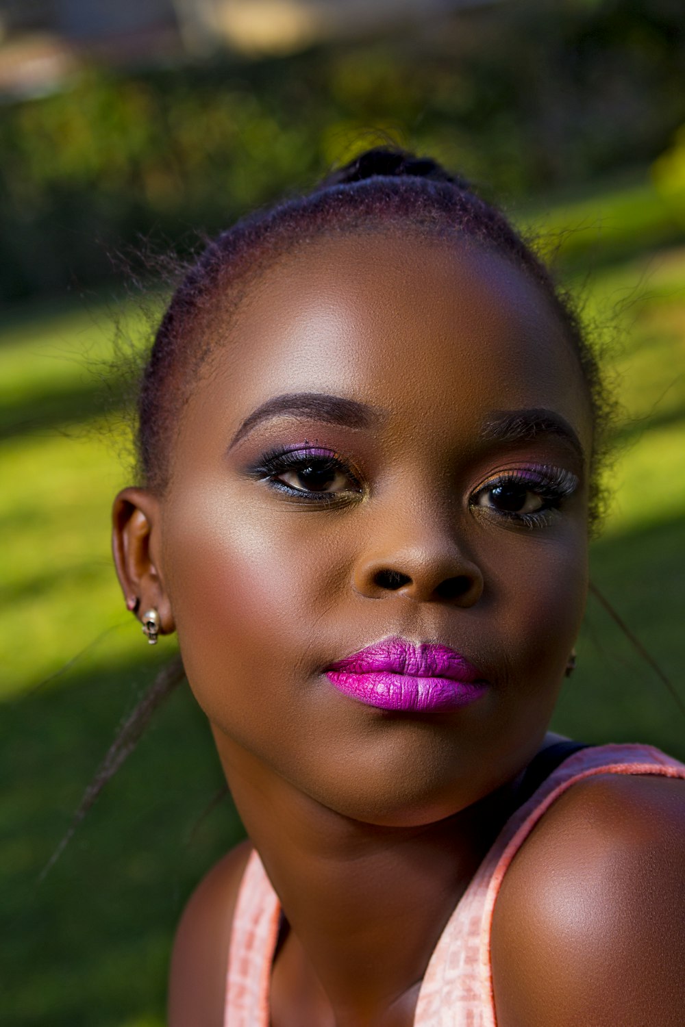 a person with a pink and purple dress