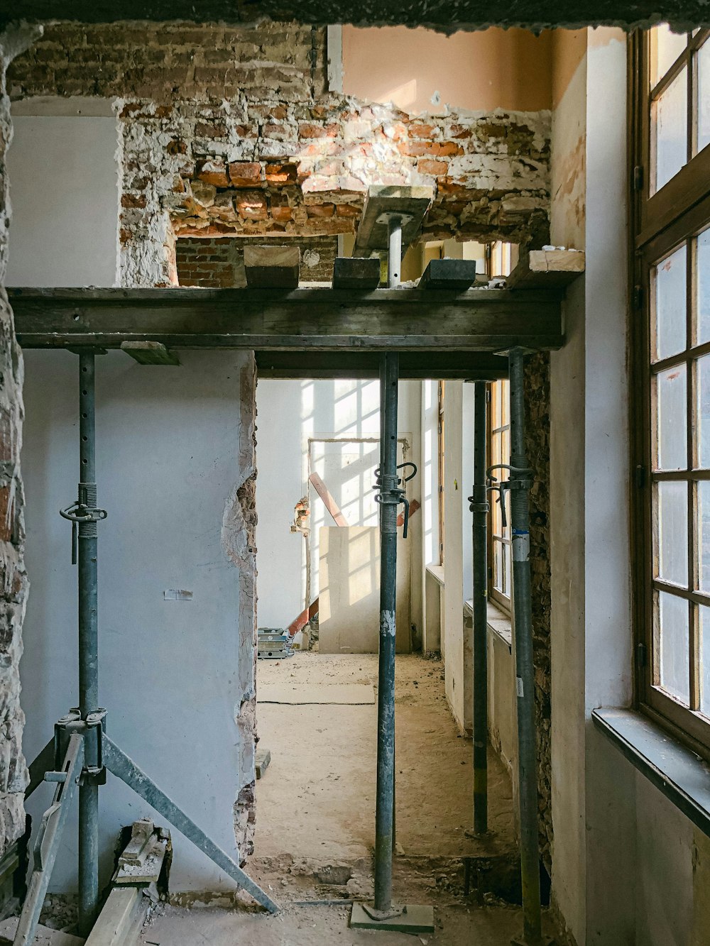 a room with a sink and pipes