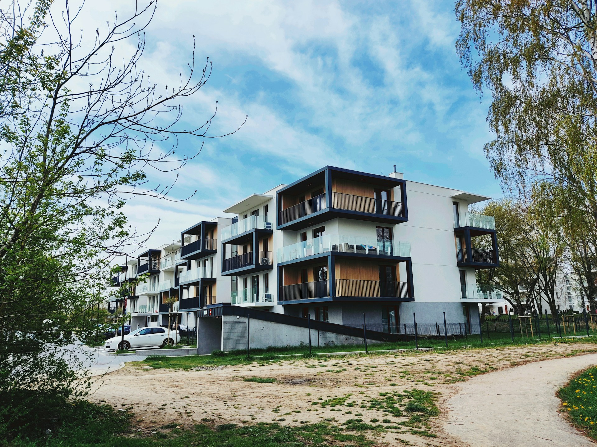 a large building with a fence around it