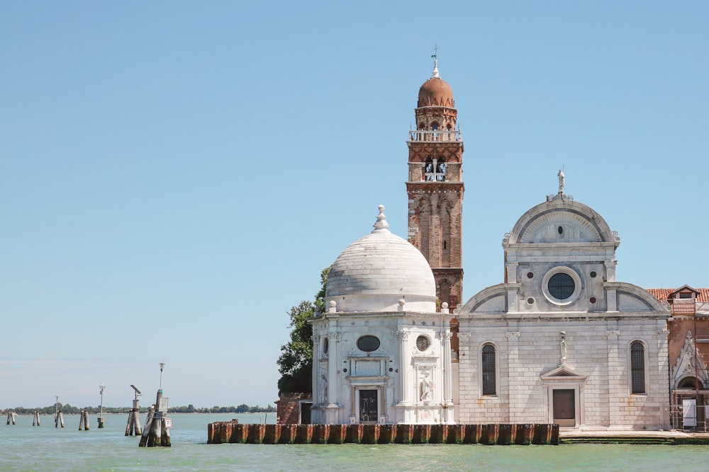 a building with a domed roof by water