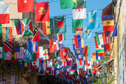a wall with many flags from it