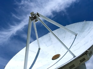 a white structure with a blue sky