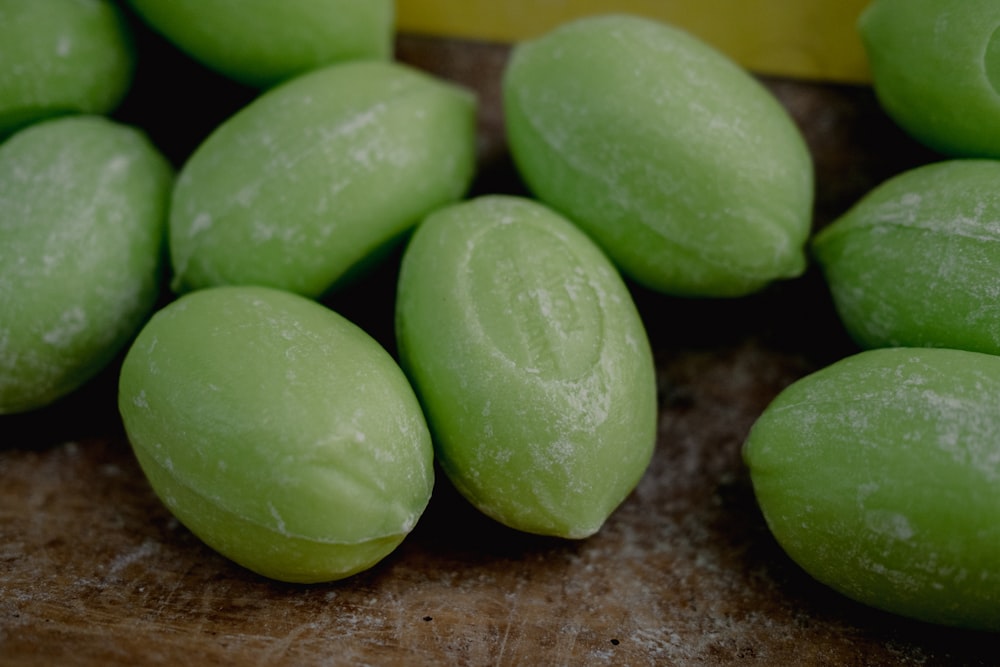 a group of green round objects