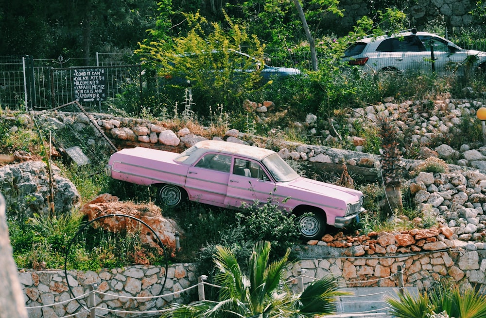 a car parked in a rocky area