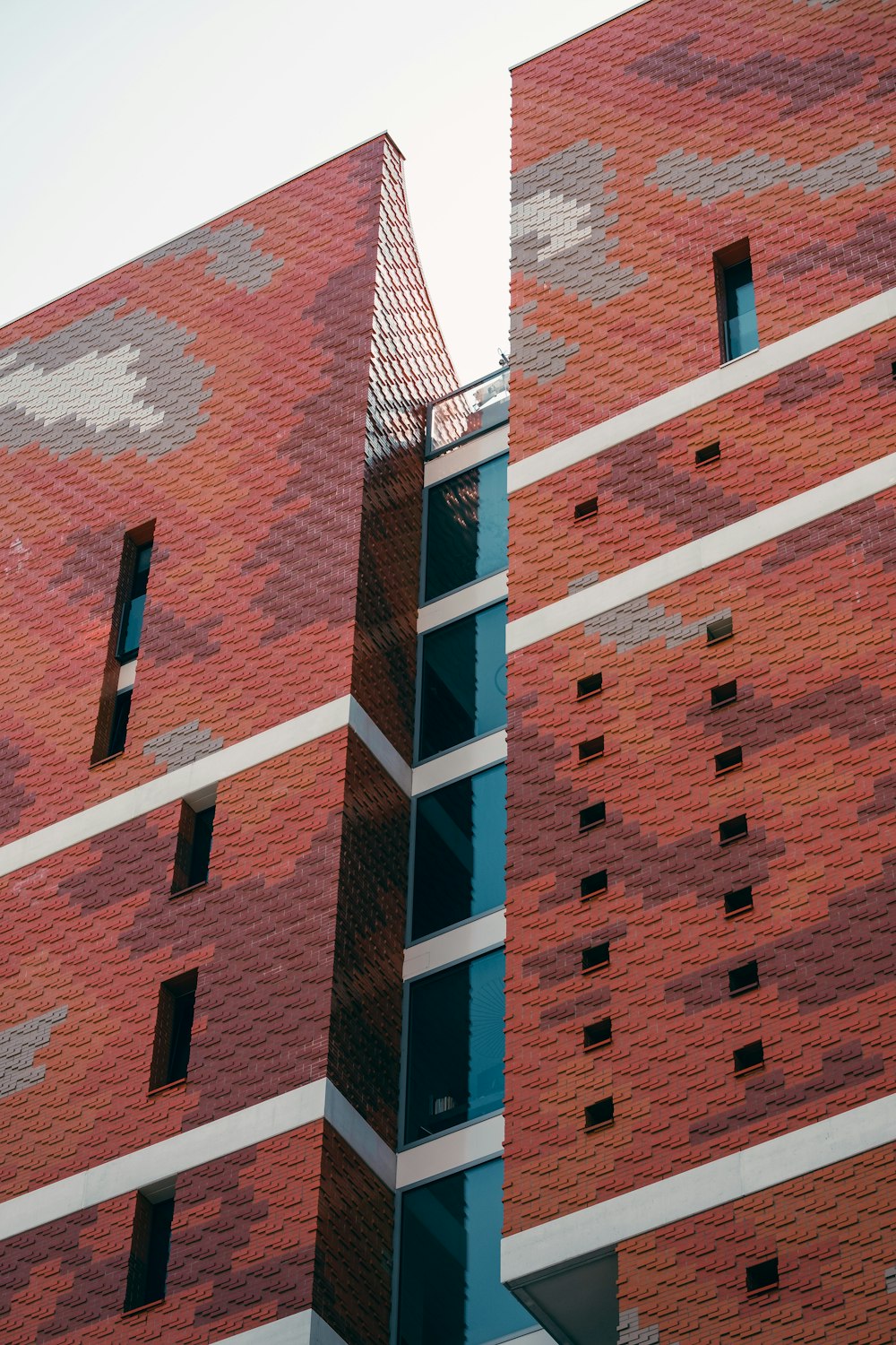 a tall building with a blue column