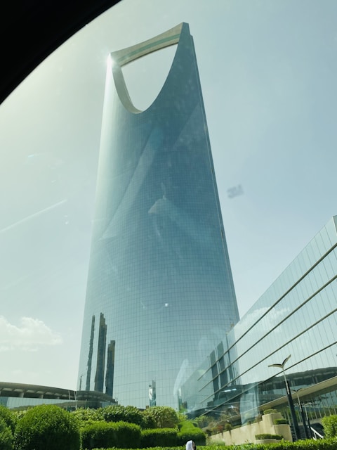 a tall building with glass walls