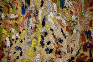 Colorful acrylic abstract painting with vibrant brush strokes on canvas.