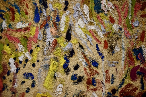 A vibrant hand-painted canvas by Gabriel Alba showcasing bold colors and dynamic brushstrokes.