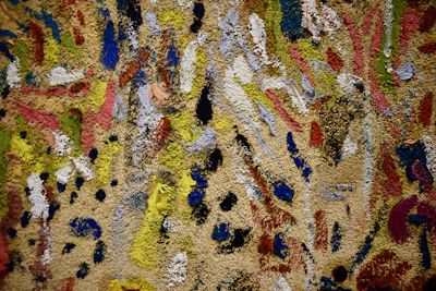 A vibrant canvas painting full of colorful abstract shapes by Fada Vieira.