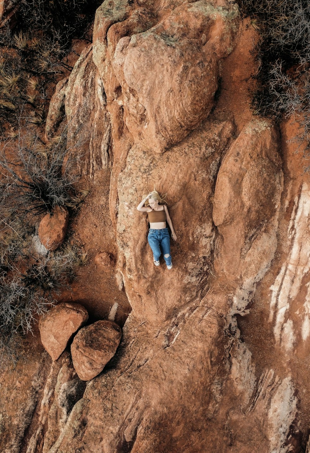 a person climbing a rock