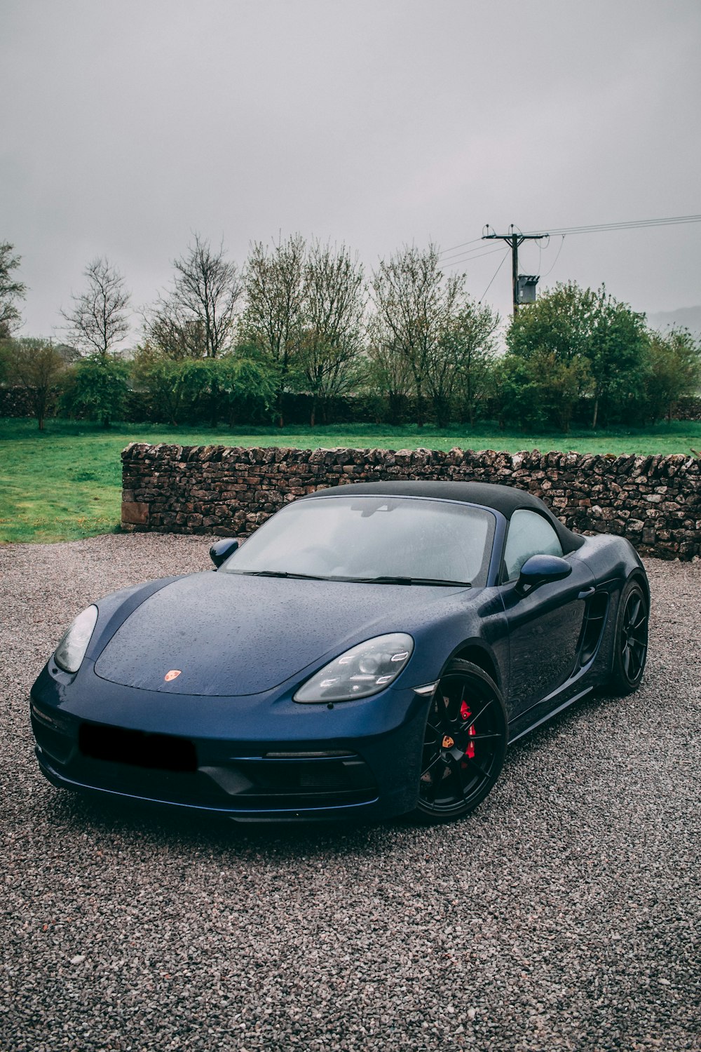 a car parked on gravel