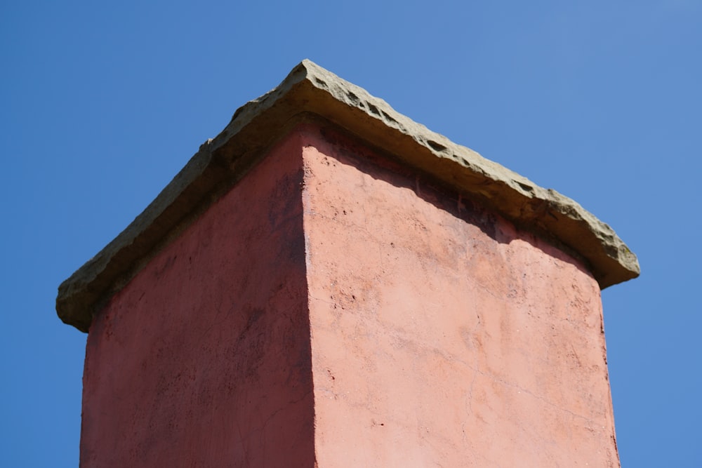 a pink and white building