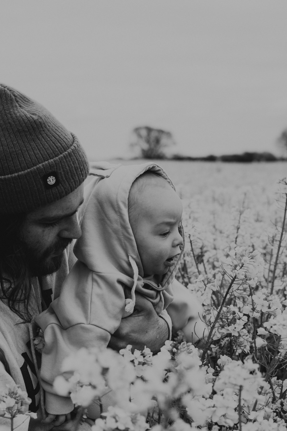 a man and woman in a field