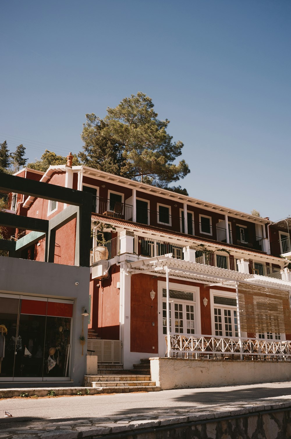 a building with a tree in the background