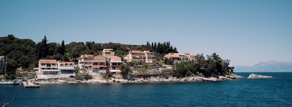 a group of houses on a rocky island