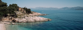 A serene coastal landscape featuring vibrant marine life and clear blue waters, symbolizing the beauty of coastal ecosystems.