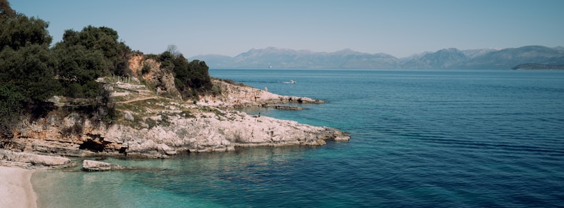 A serene coastal landscape featuring vibrant marine life and clear blue waters, symbolizing the beauty of coastal ecosystems.