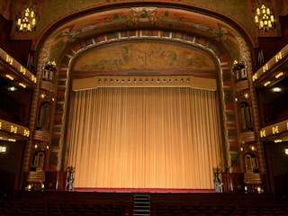 a large ornate theater with a large stage