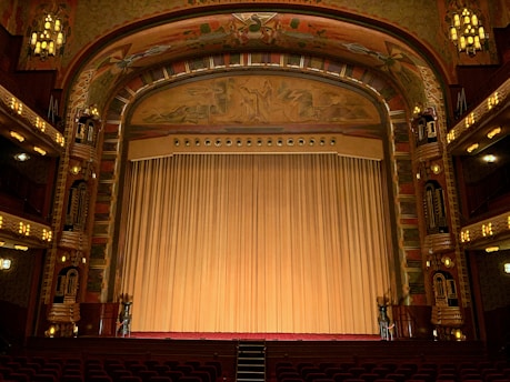 a large ornate theater with a large stage
