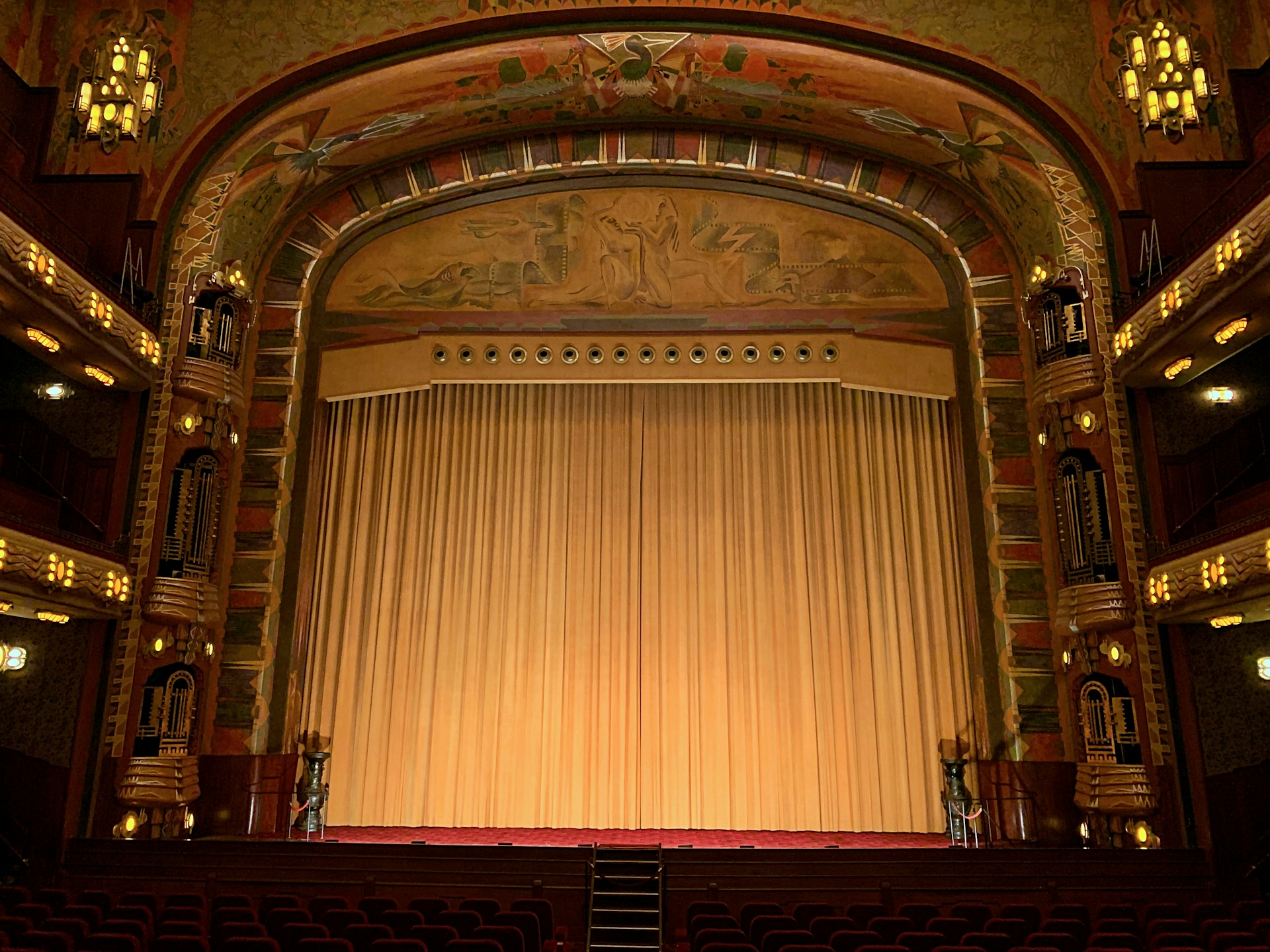 a large ornate theater with a large stage
