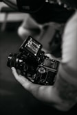 a person holding a camera