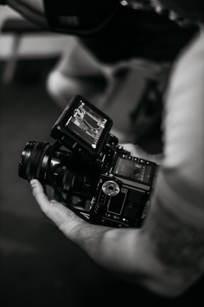 a person holding a camera