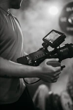 a man holding a camera