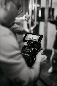 a person holding a camera