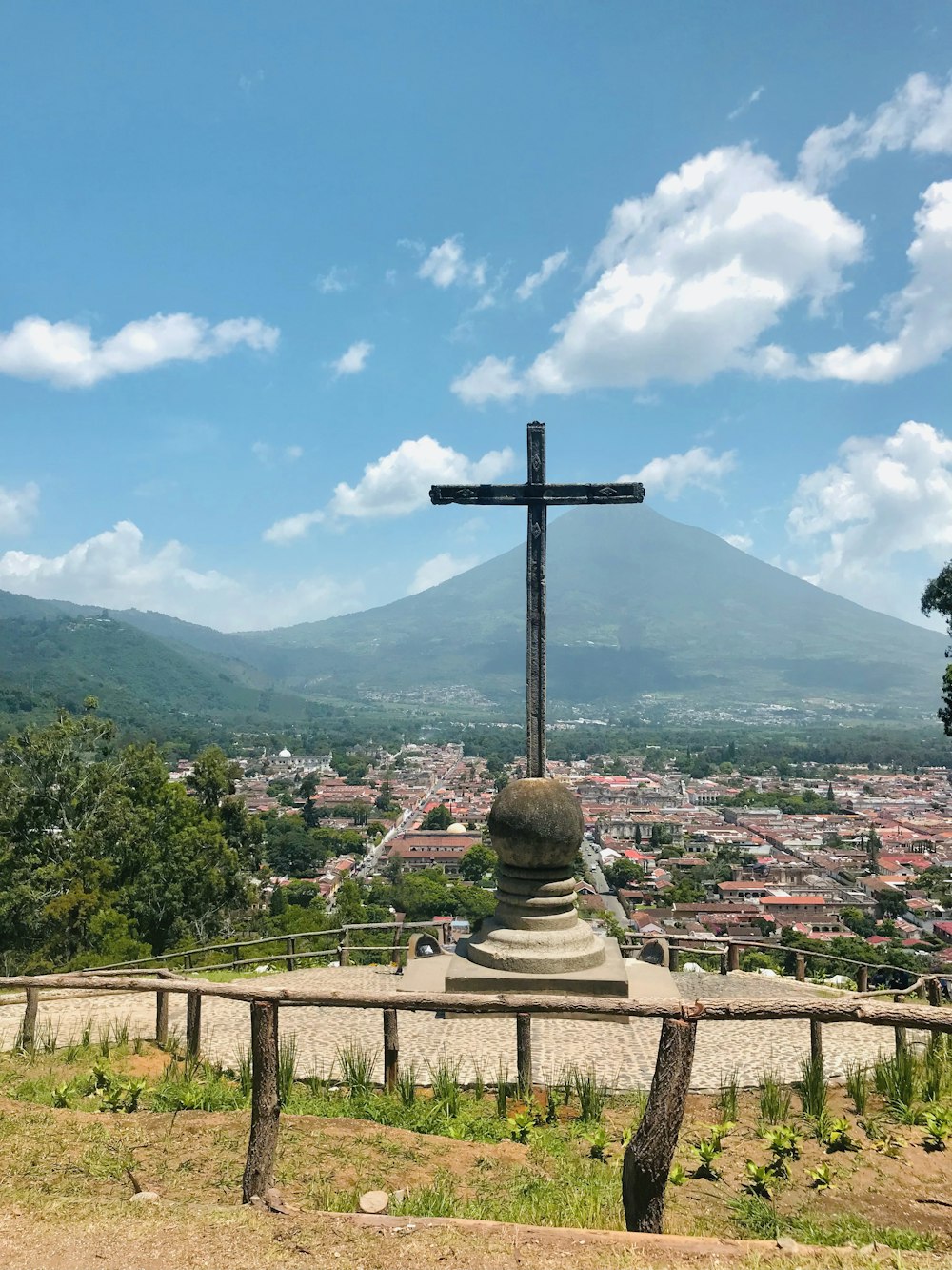 a cross on a hill