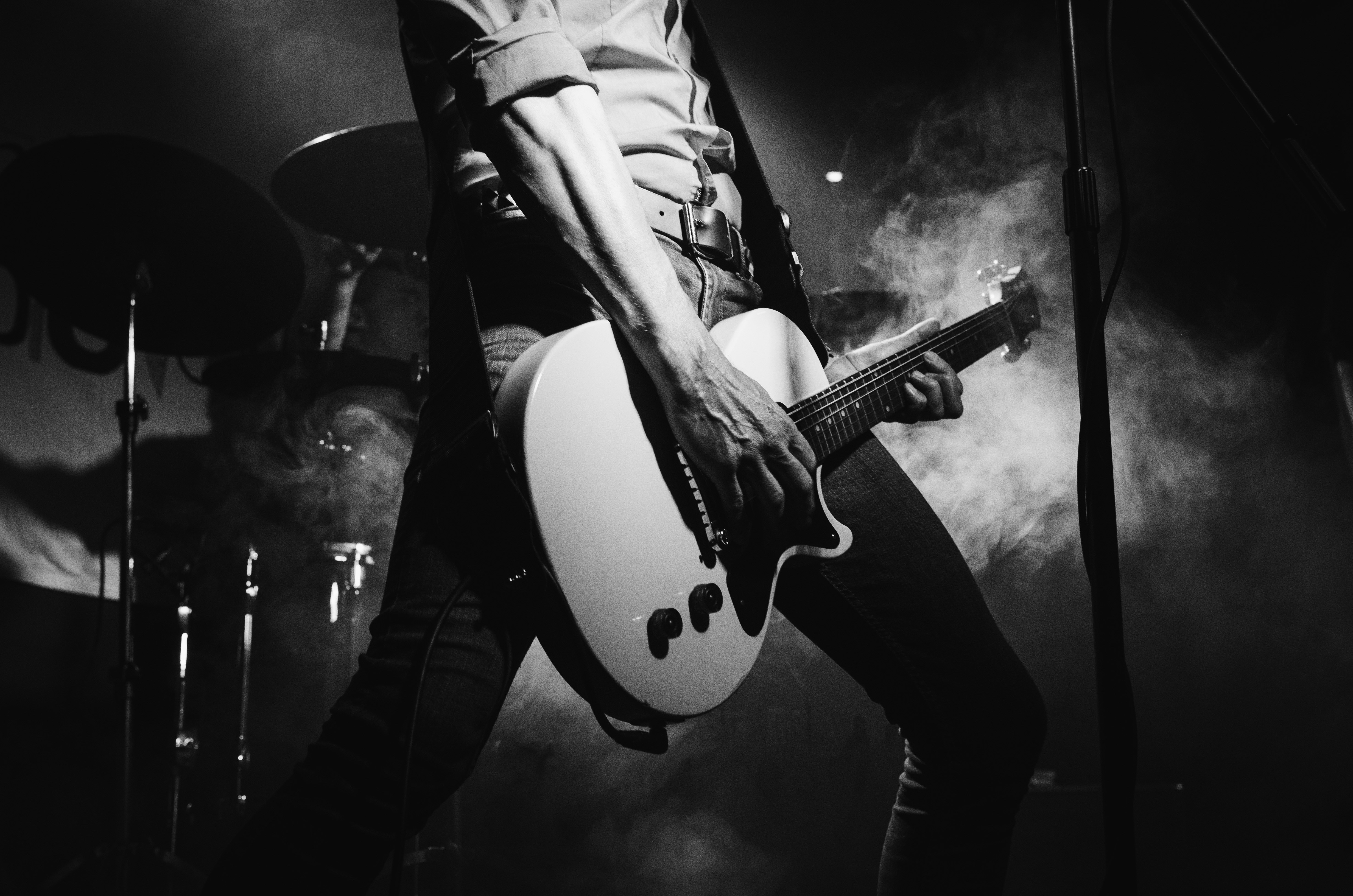 a person playing a guitar