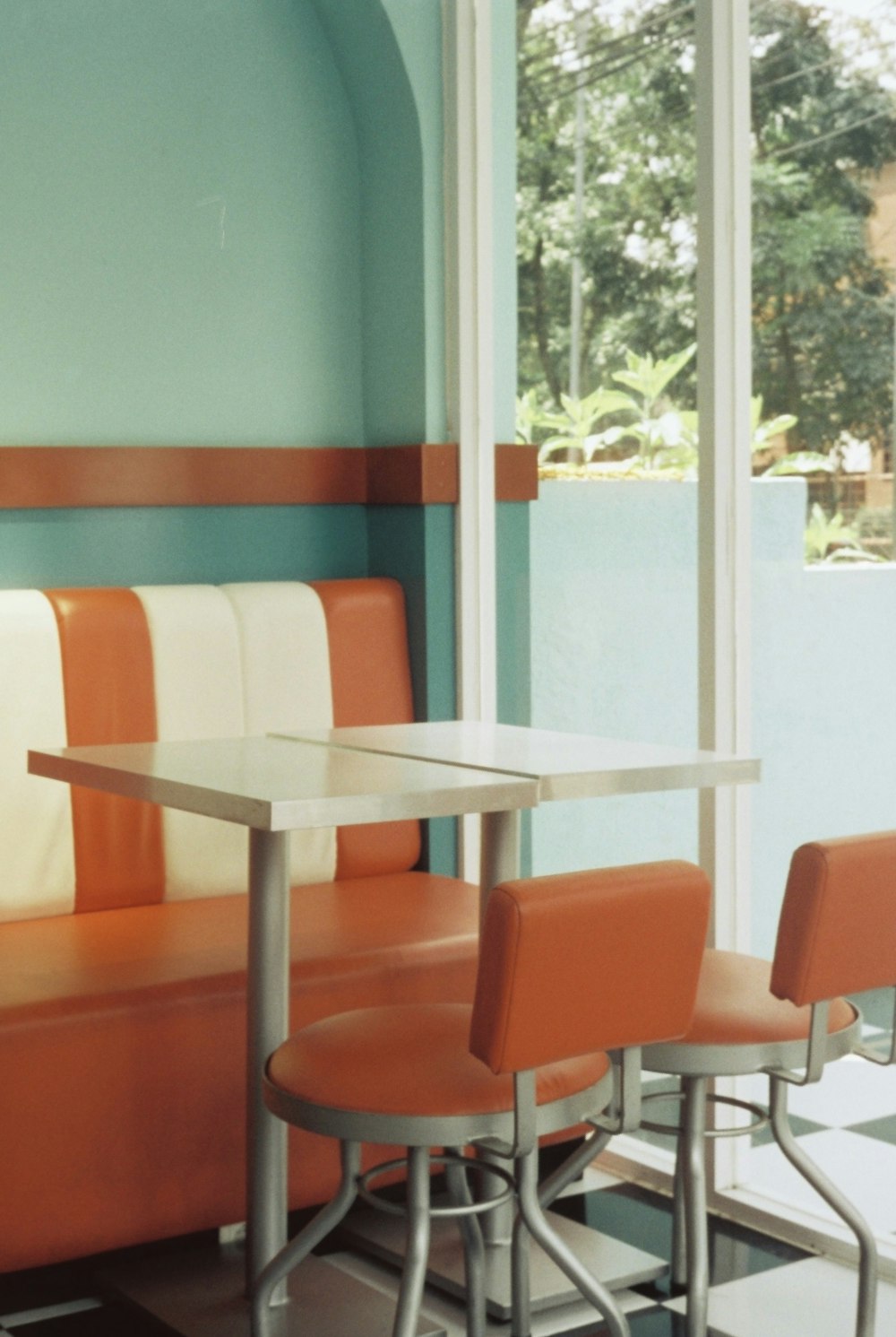 a group of chairs in front of a window