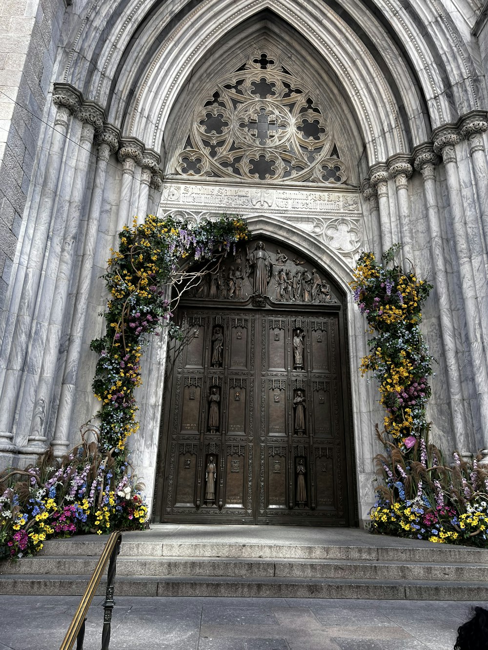 a door with flowers on the side