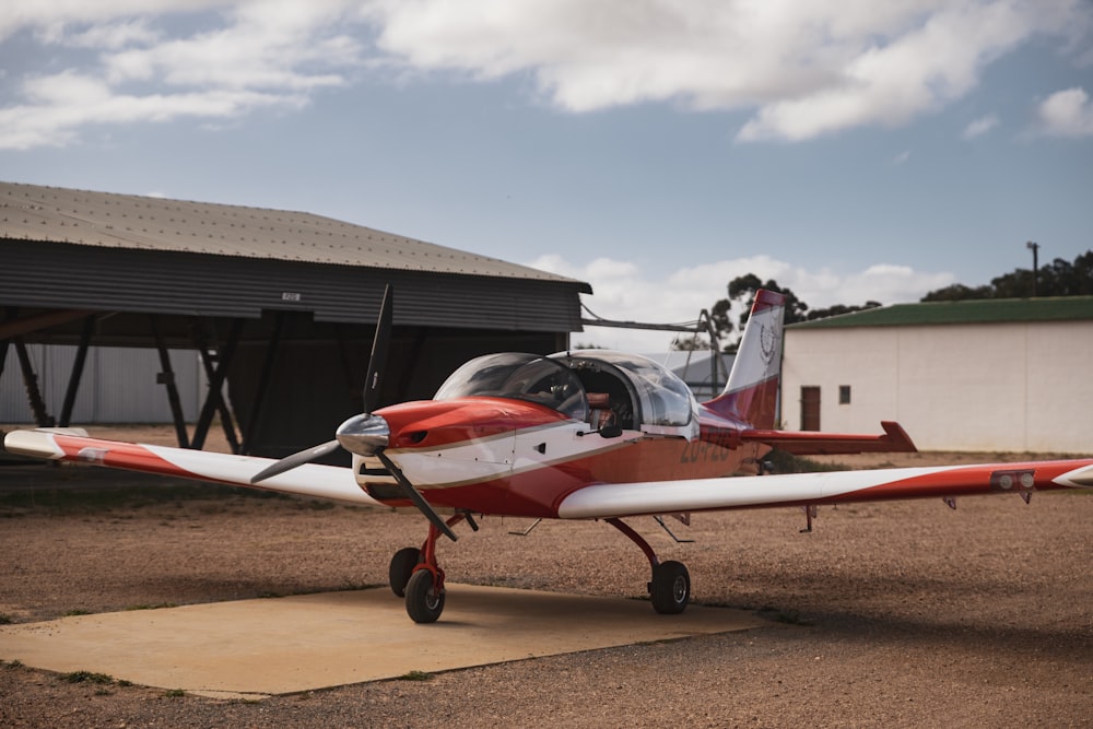 a small airplane parked on the ground