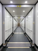 a long hallway with glass doors