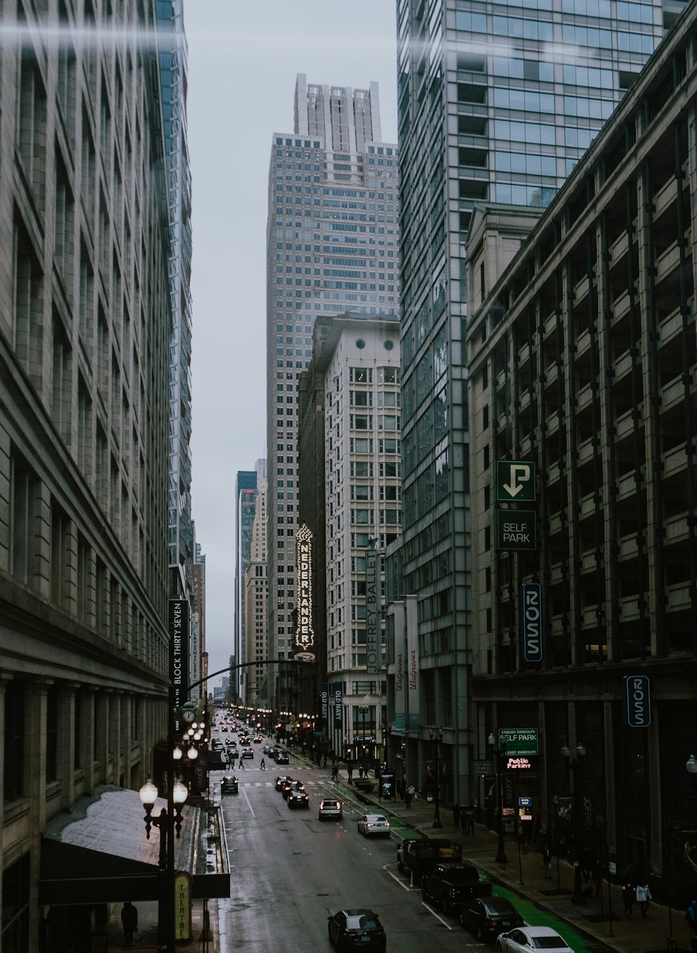 a city street with tall buildings