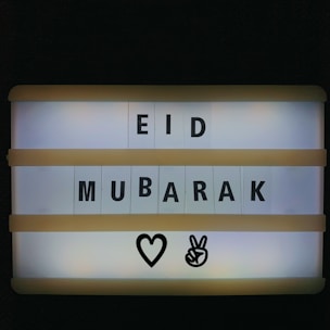 a yellow and white box with numbers