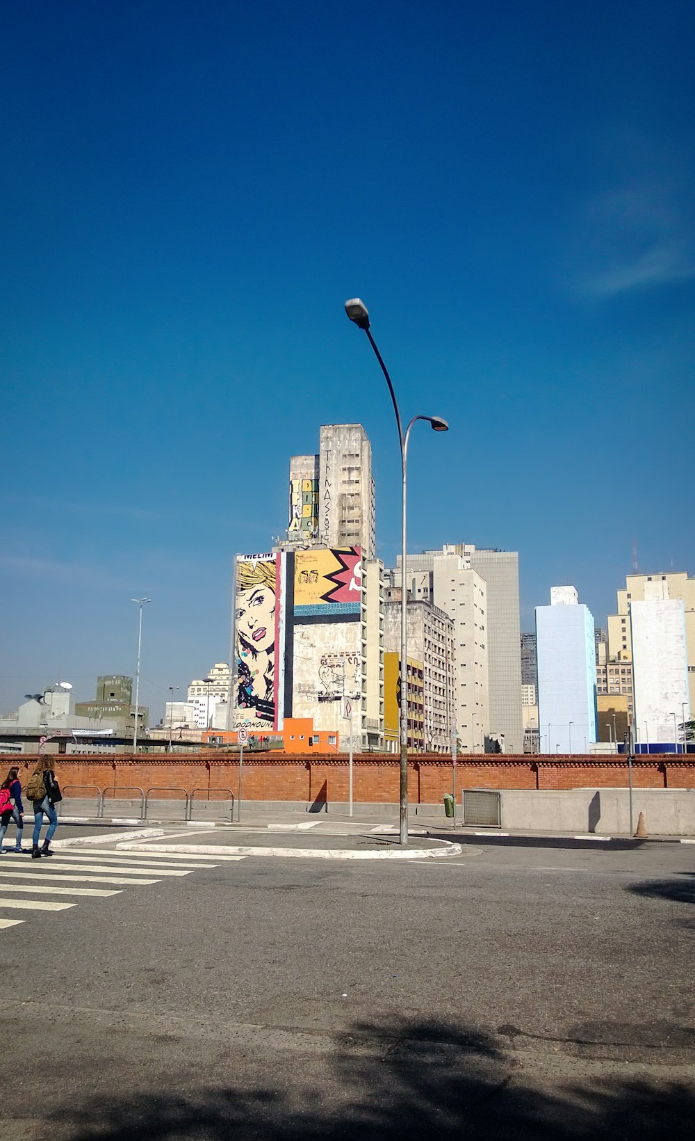 a city skyline with a street light