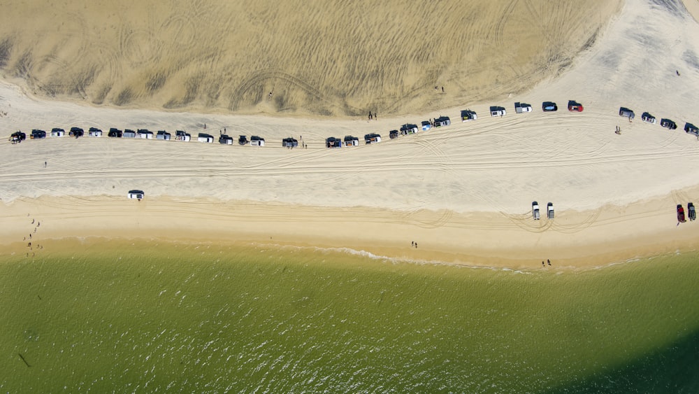 a group of cars parked in a field