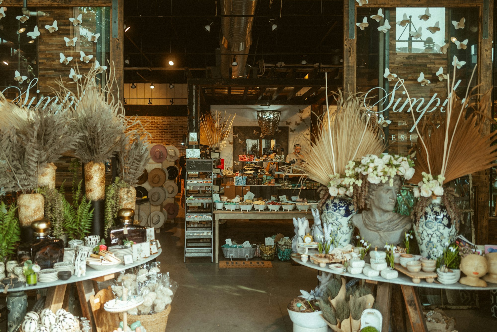 A picturesque retail store location selling candles, soaps, and home decor