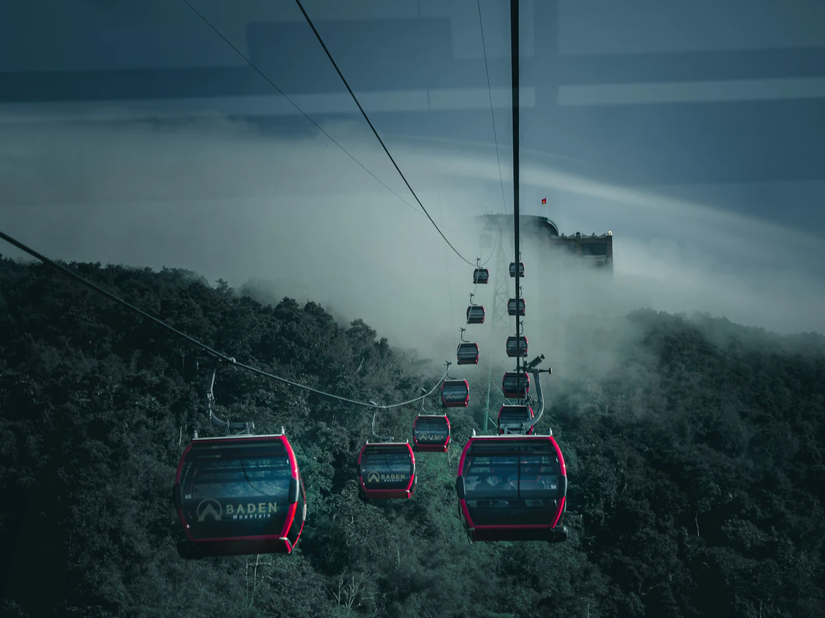 Sun World Ba Den Mountain Cable Car Gliding Over Forest Canopy