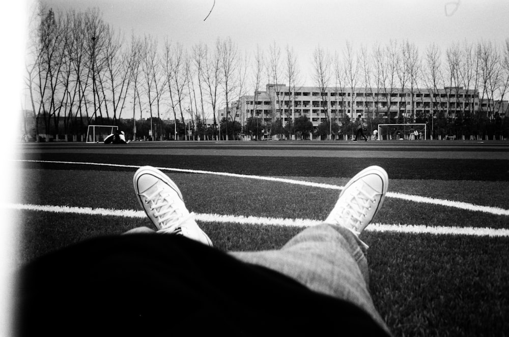 a person's feet on a basketball court