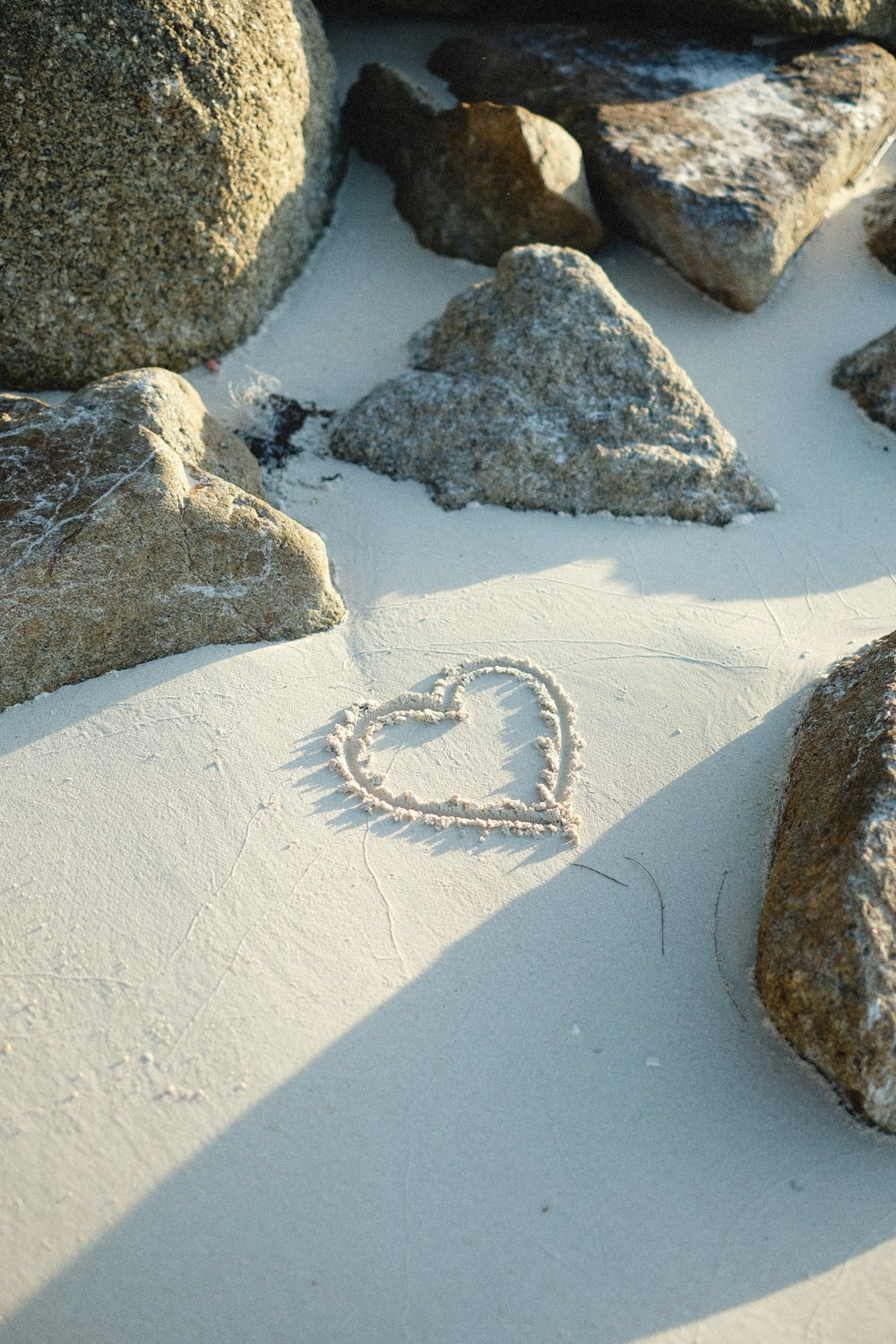 a group of rocks on a beach