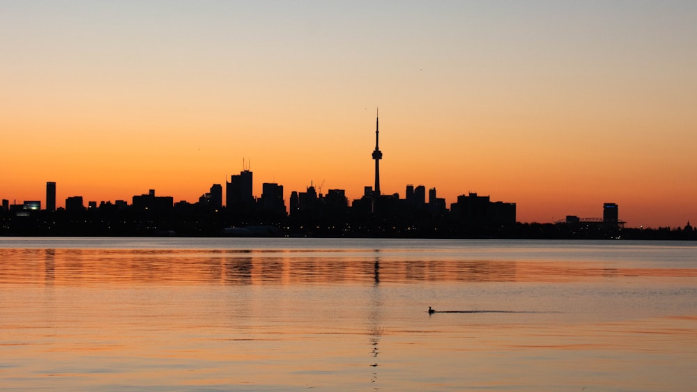 a city skyline at sunset