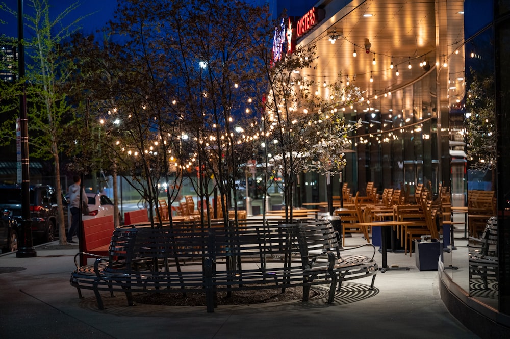 a group of tables and chairs outside