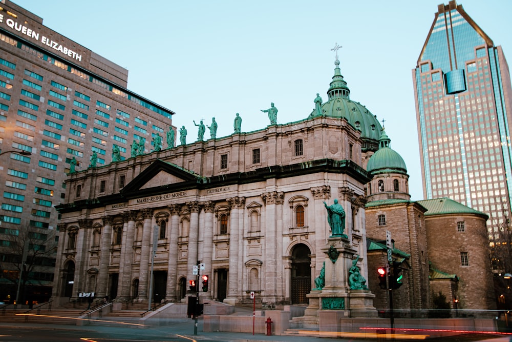 a large building with a statue on top