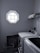 A cozy laundry room with neatly folded clothes and a warm ambiance.