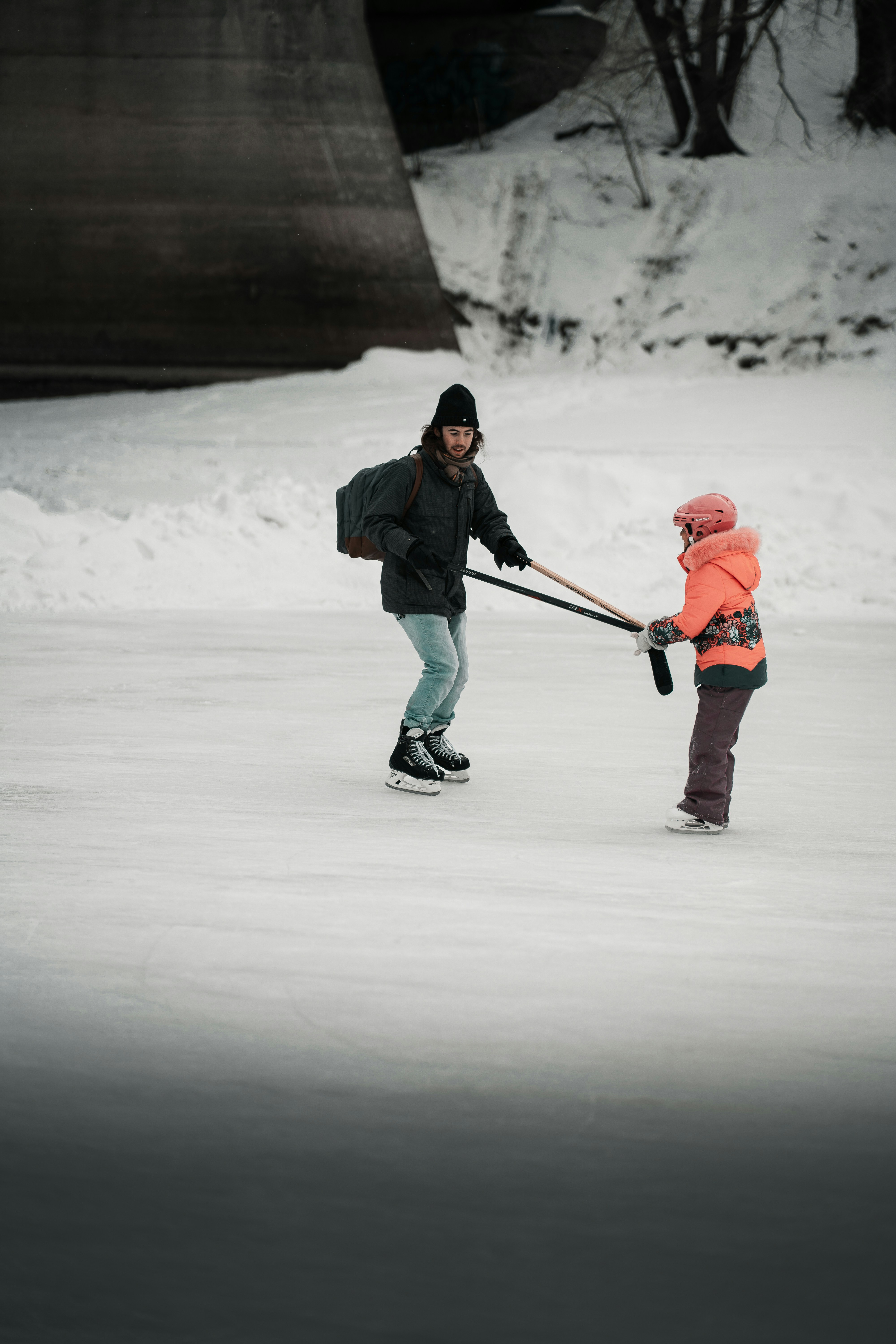 a person and a child on ice