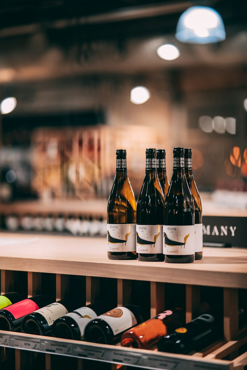 a shelf with bottles of wine on it